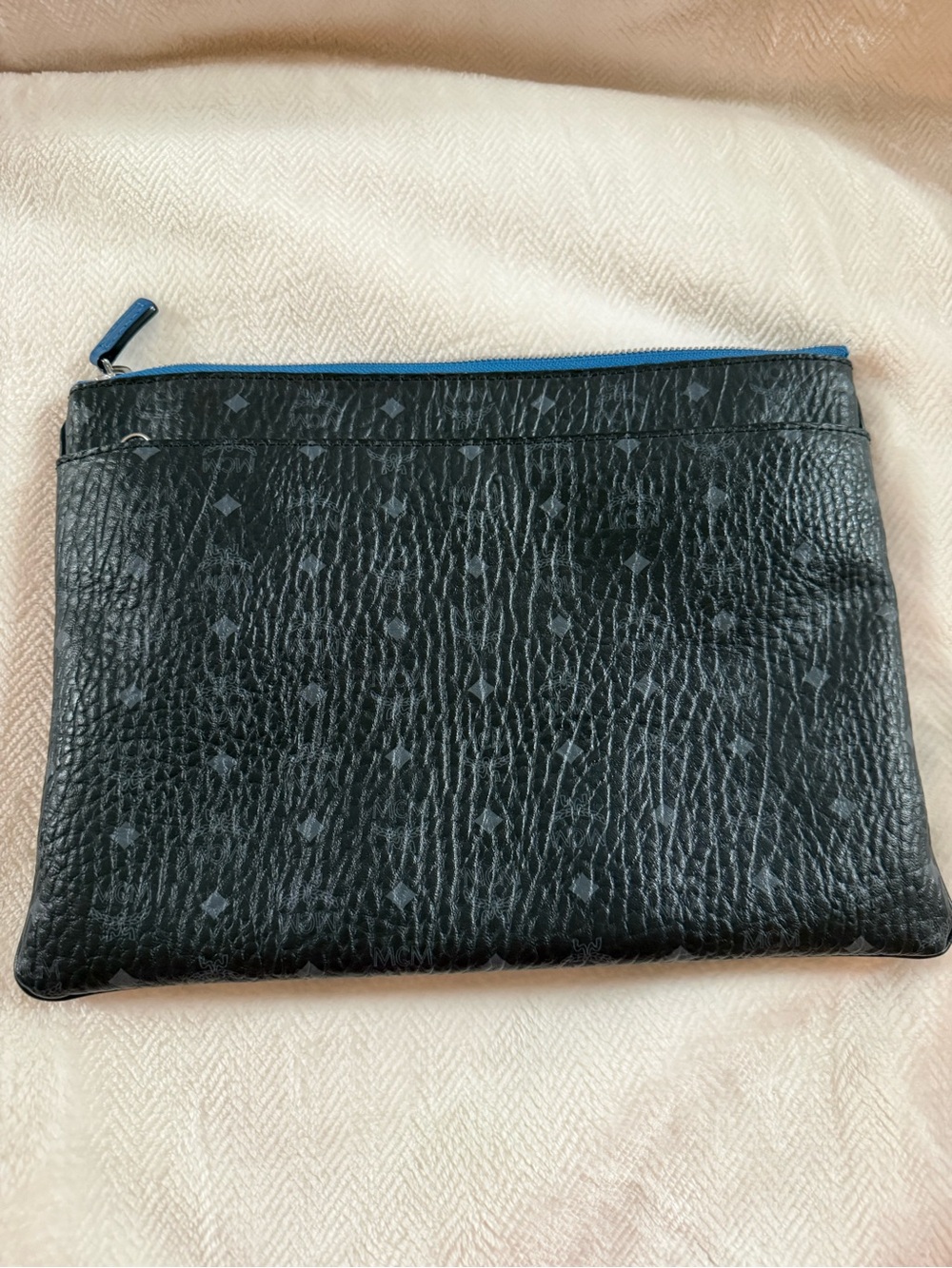 MCM Black Leather Crossbody Pouch with Blue Zip Accent